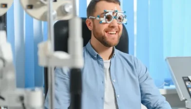 Patient undergoing a vision evaluation at a clinic with an ophthalmologist in Mexico, using specialized equipment for accurate diagnosis.